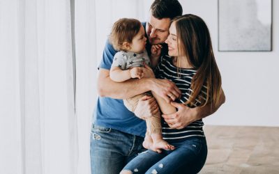 young-family-with-their-little-son-home